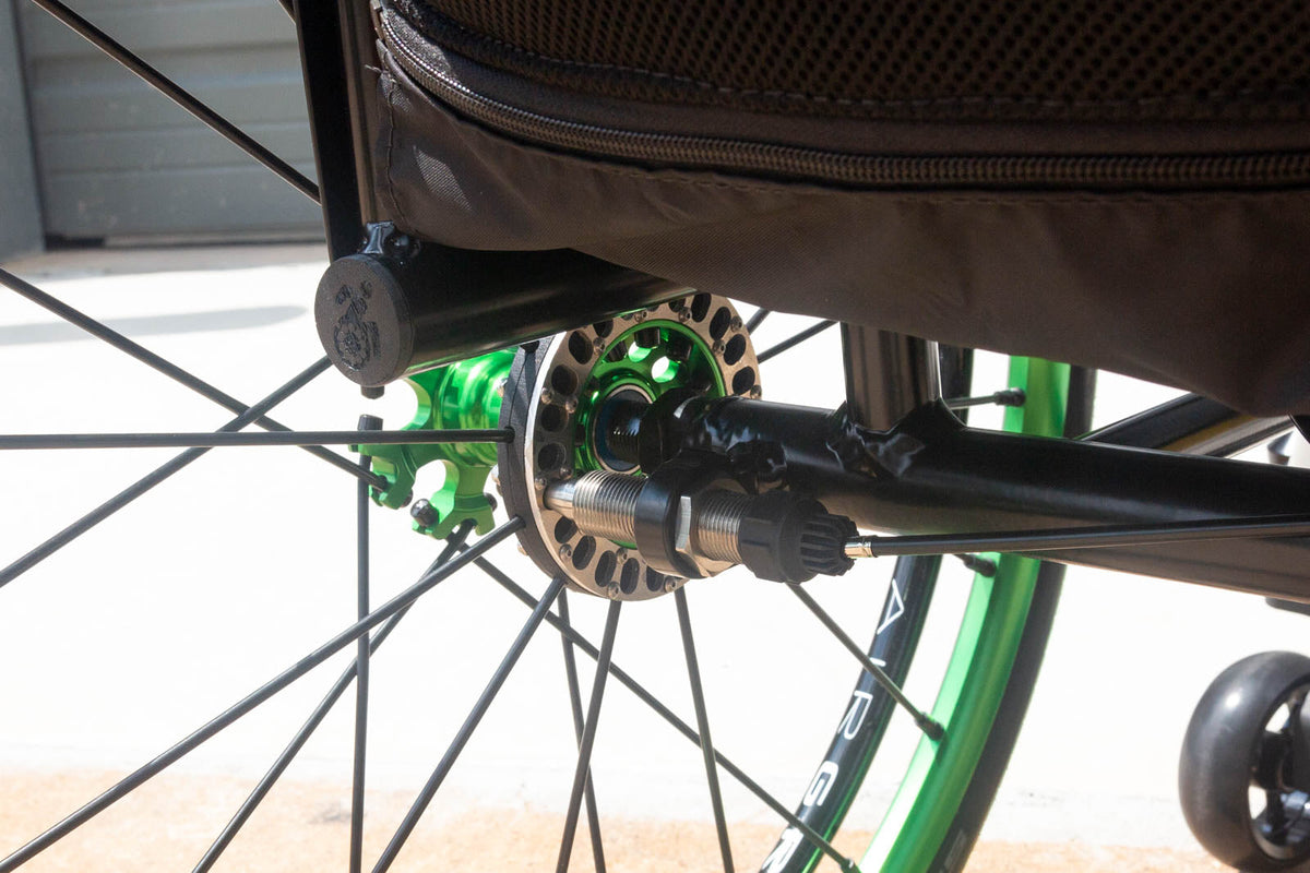 Push Lox one-handed wheelchair hub locking system