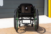 Rear view of a Push Lox Wheelchair Wheel Lock system mounted to a Reckless Wheelchairs Ultra Rigid Wheelchair